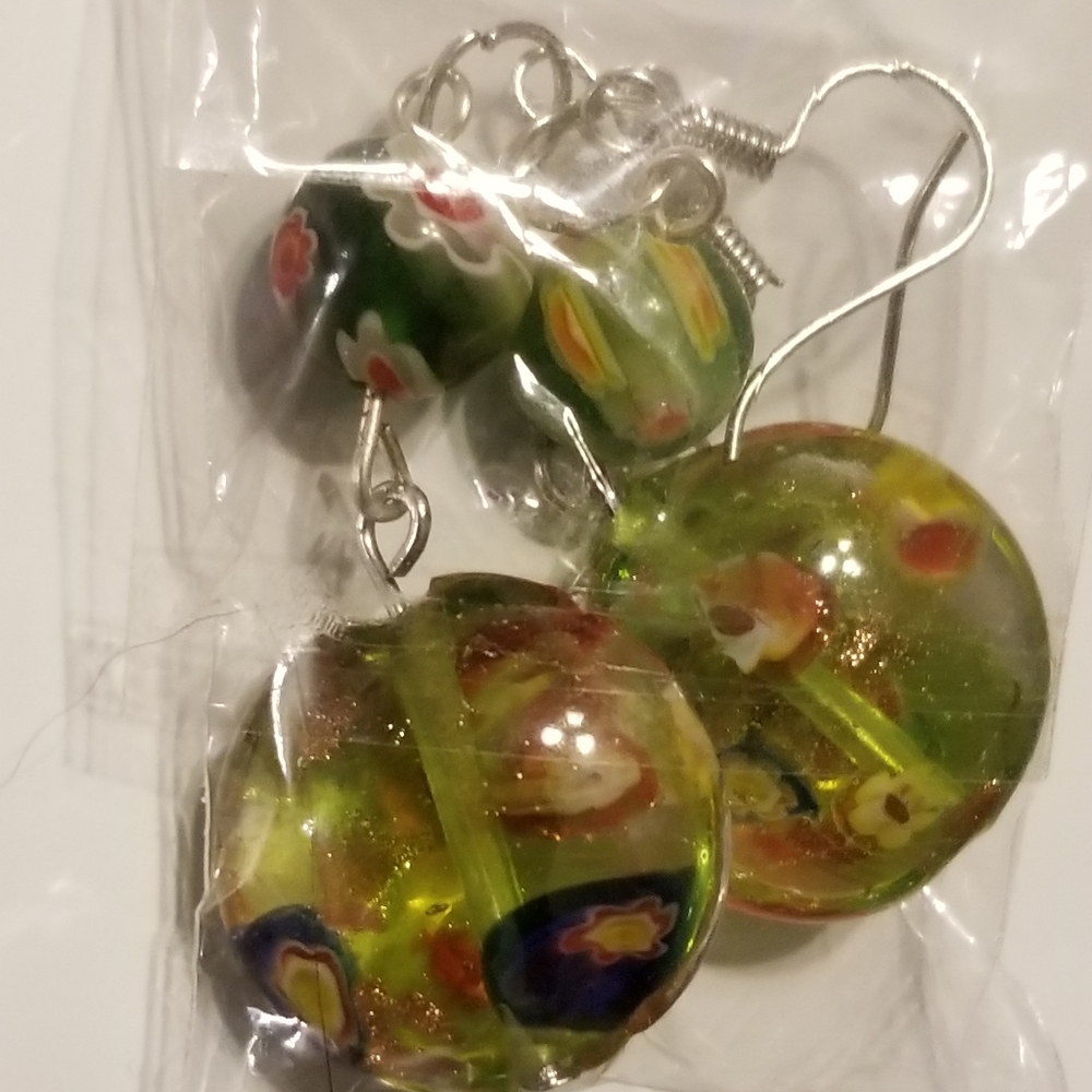 Glass dangle earrings. New, in packaging.